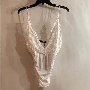 White lace lingerie bodysuit